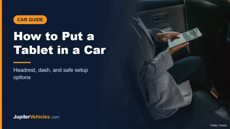 Passenger using a tablet inside a car