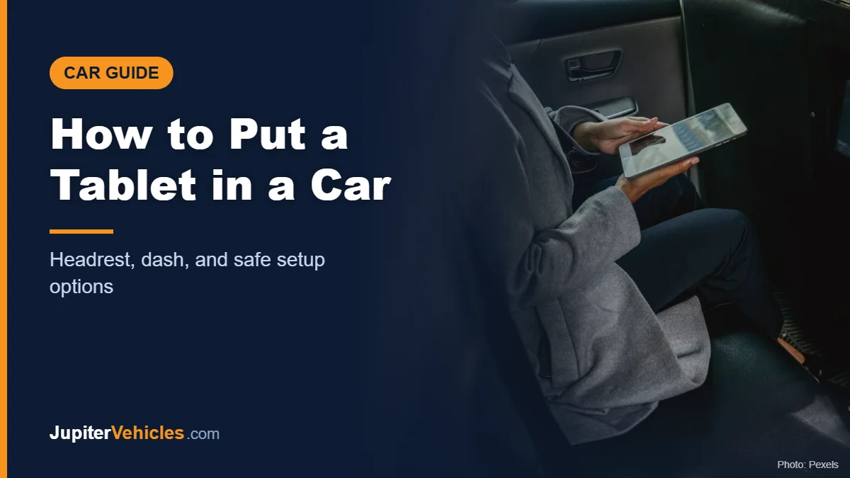 Passenger using a tablet inside a car