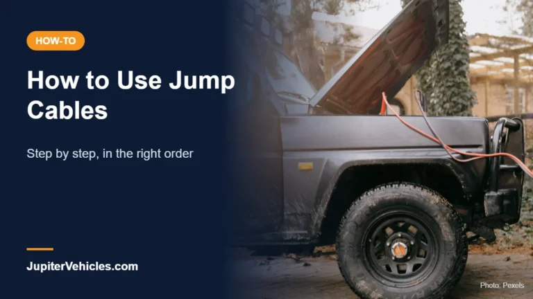 Jumper cables attached to a car battery