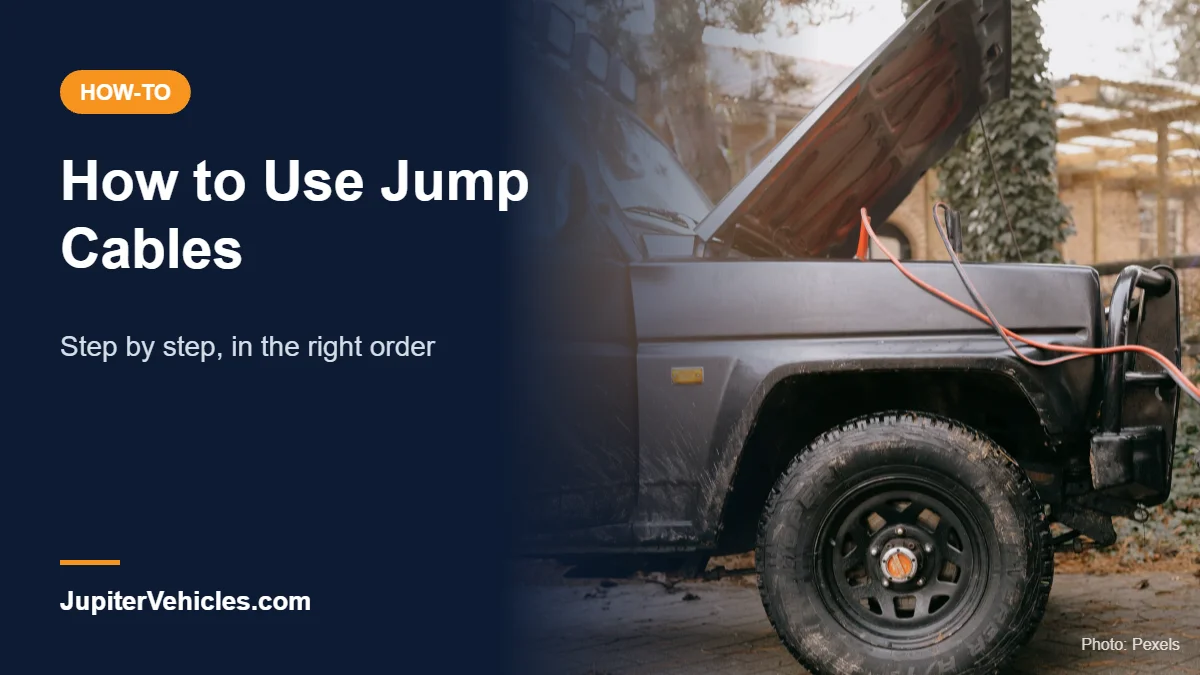 Jumper cables attached to a car battery