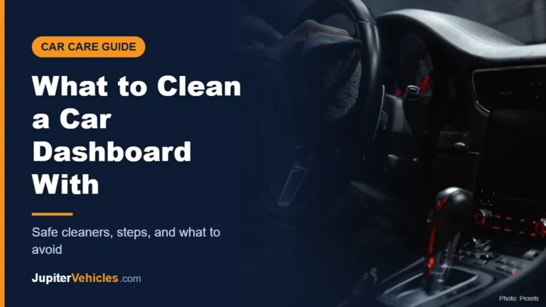 Person cleaning a car dashboard and steering wheel