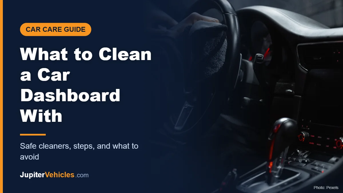 Person cleaning a car dashboard and steering wheel